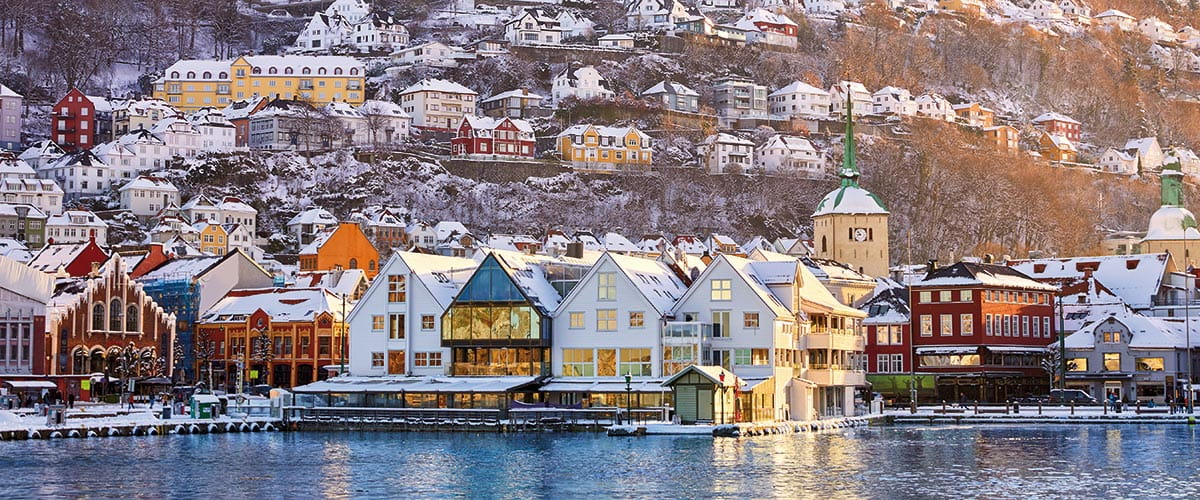 The historic Bryggen waterfront in Bergen covered in snow